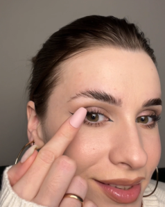 woman with lifted eyebrows